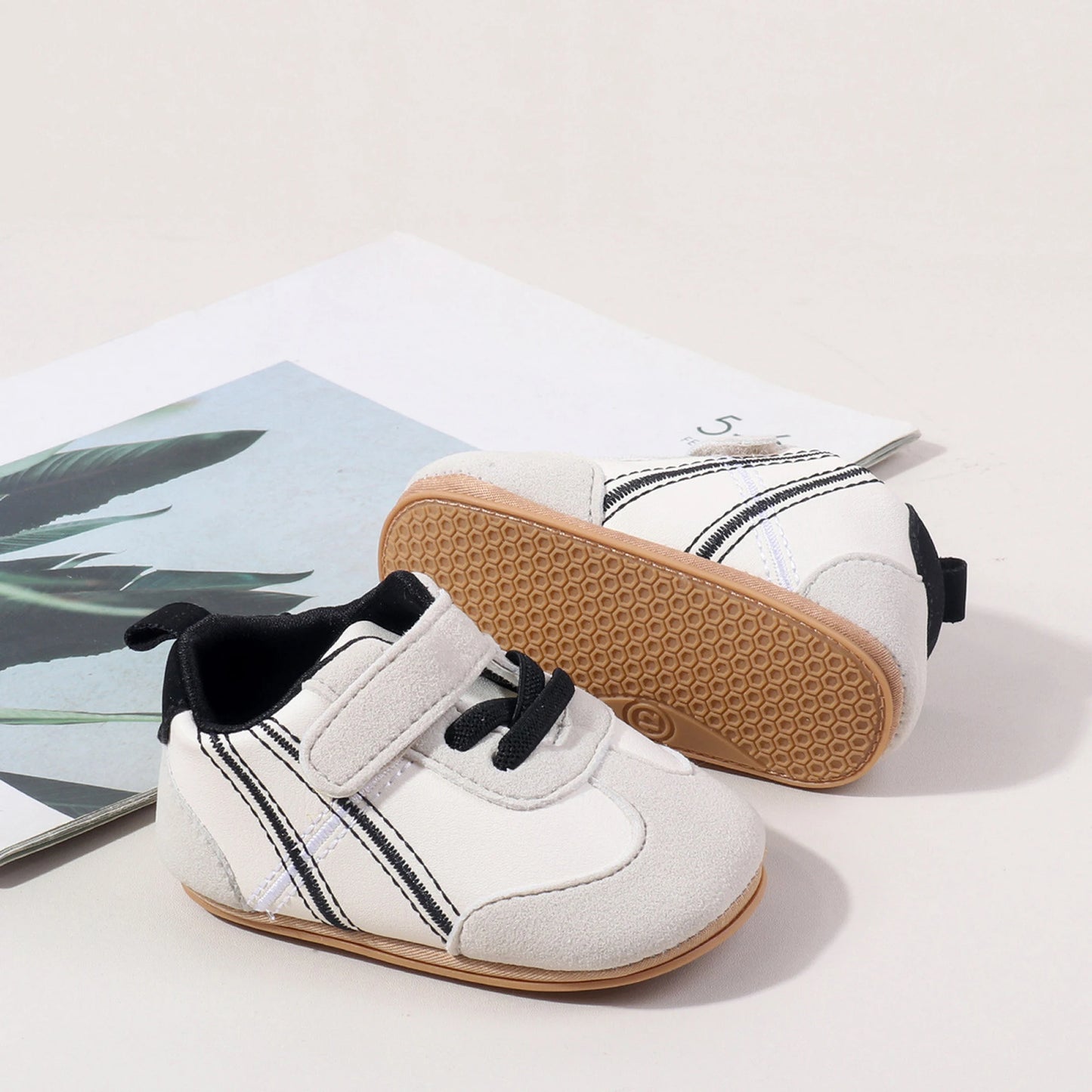 Adorable Baby Sneakers with Trendy Design Easy-to-Use Hook and Loop Closure Comfortable Soft Sole for New Walkers