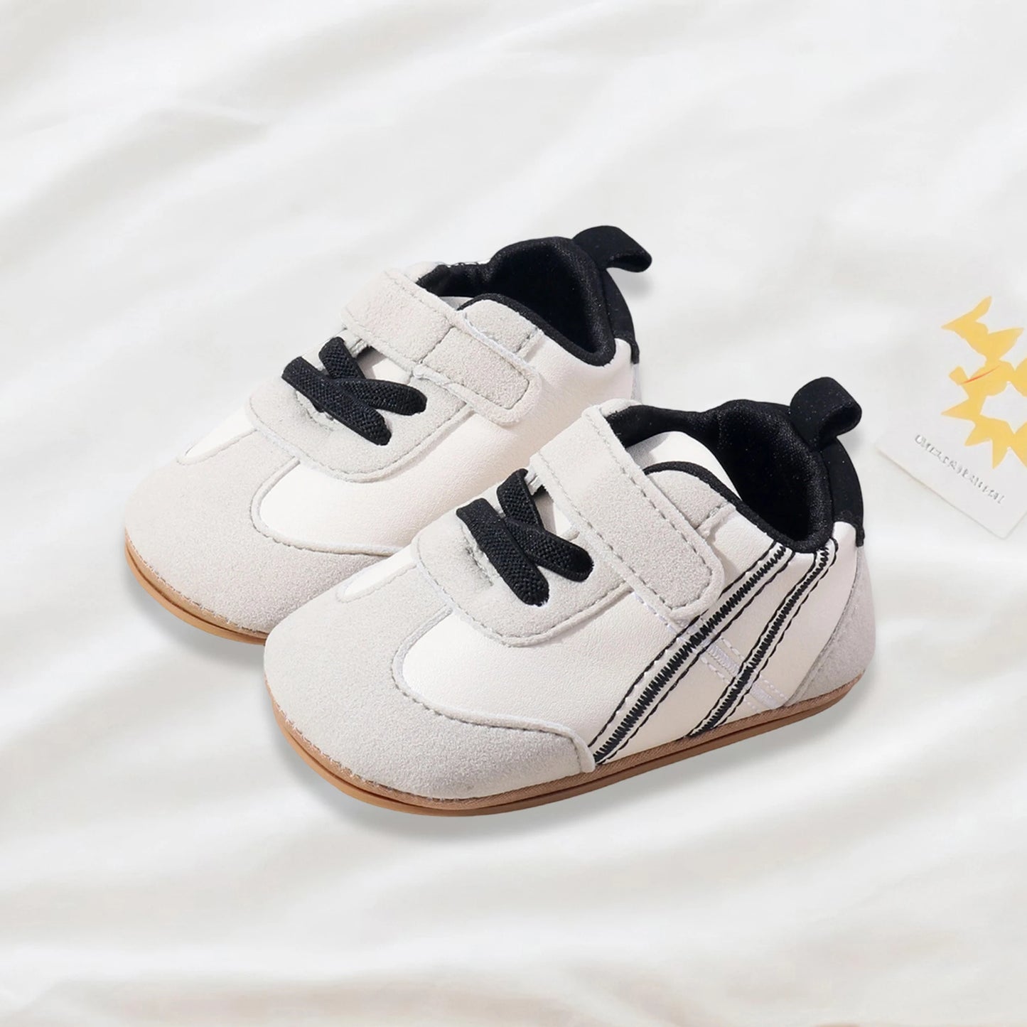 Adorable Baby Sneakers with Trendy Design Easy-to-Use Hook and Loop Closure Comfortable Soft Sole for New Walkers