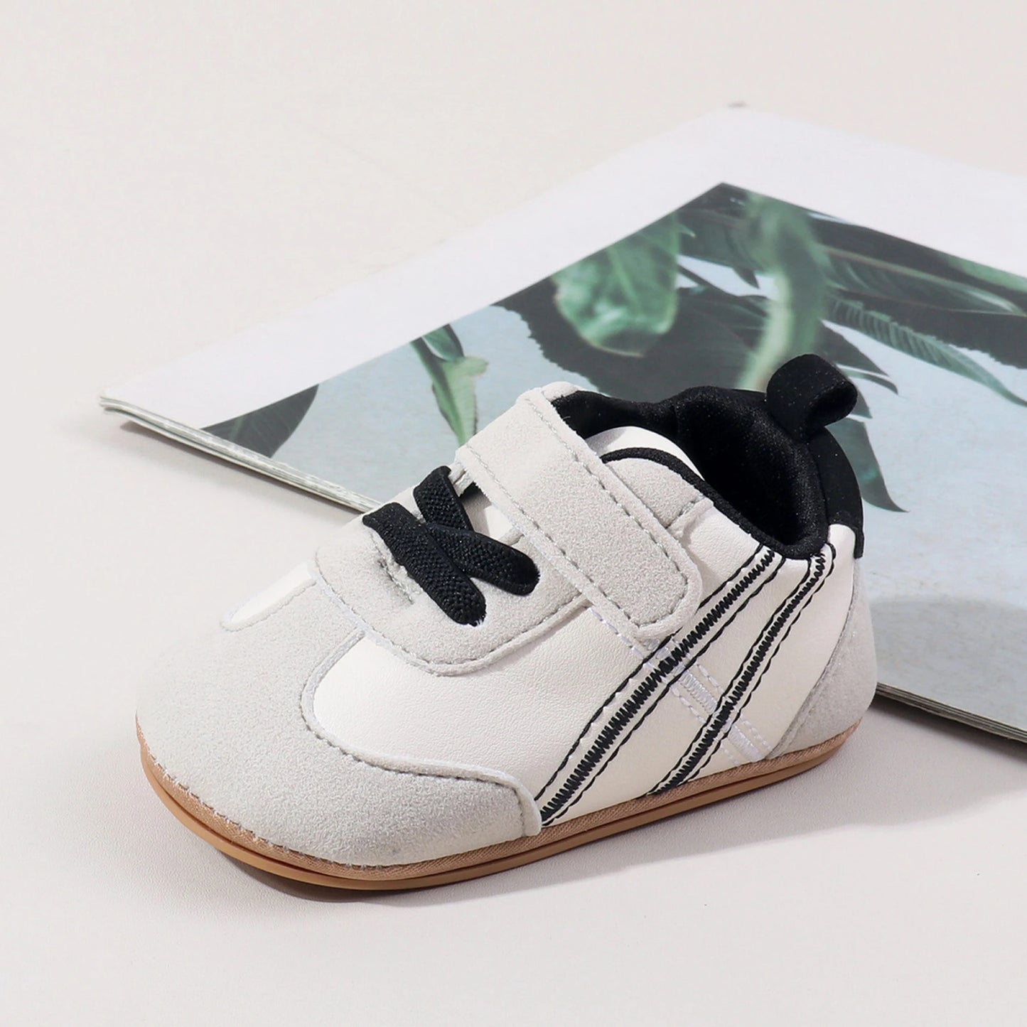 Adorable Baby Sneakers with Trendy Design Easy-to-Use Hook and Loop Closure Comfortable Soft Sole for New Walkers