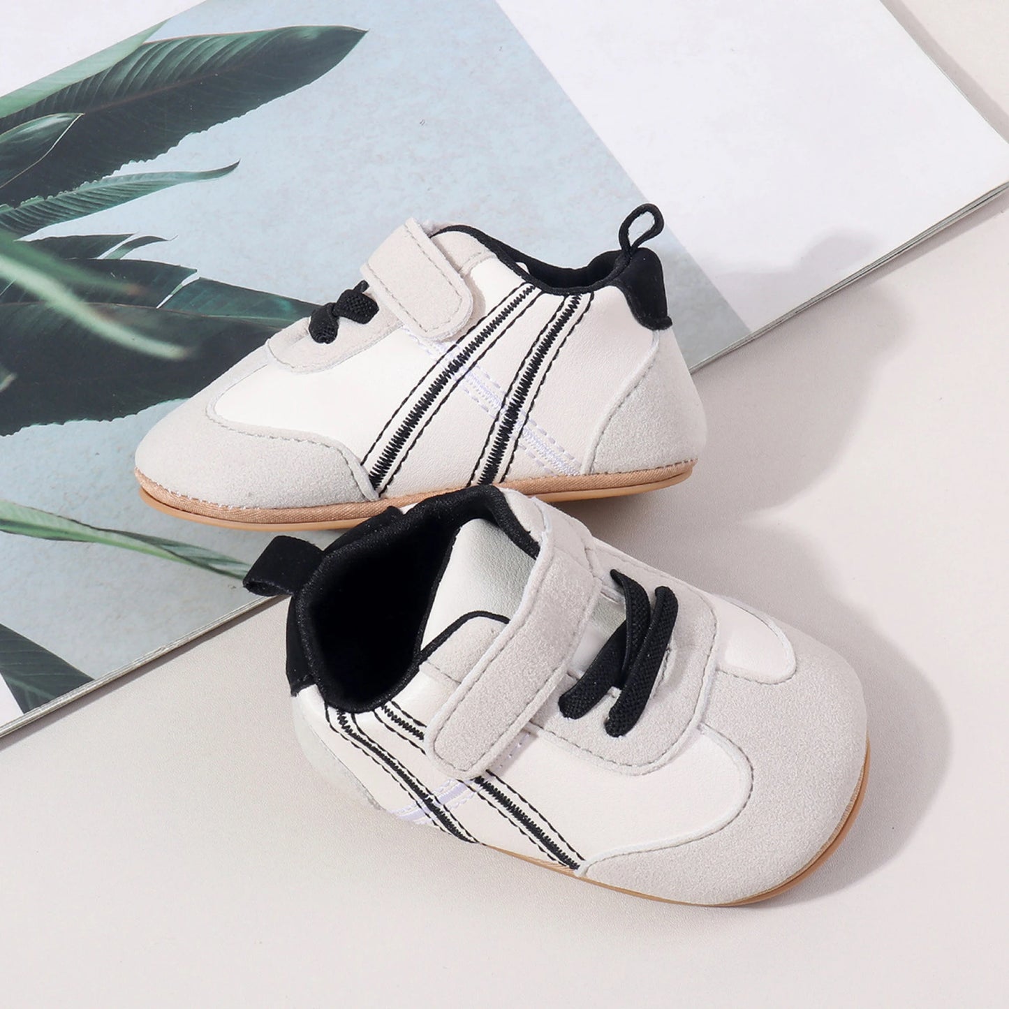 Adorable Baby Sneakers with Trendy Design Easy-to-Use Hook and Loop Closure Comfortable Soft Sole for New Walkers